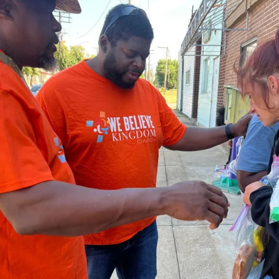 we believe kingdom church pastors praying for the homeless