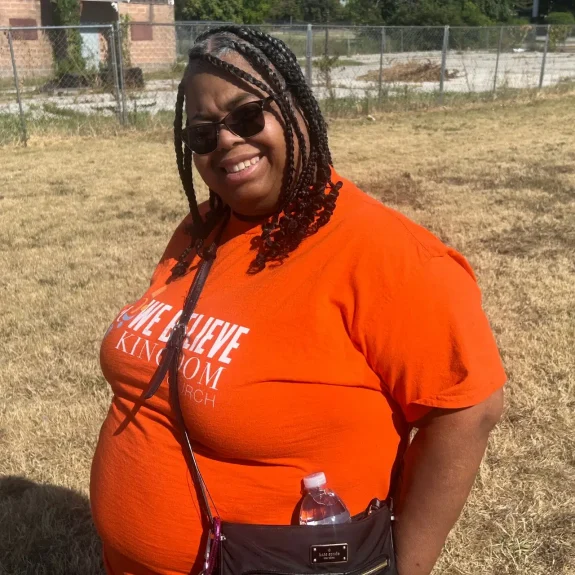 we believe kingdom church woman smiling